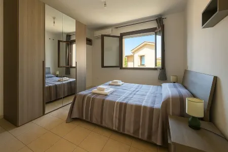 Apartment just minutes from the most beautiful beaches of Sardinia Отели рядом с достопримечательностью «L'Orchidea dei F.lli Albano»