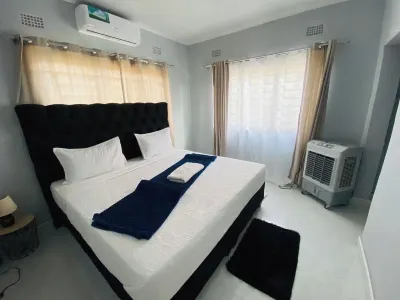 Cozy 2-Bedroom Apartment In Amazing Livingstone With AC, WiFi, 24/7 SOLAR BACKUP Hotels in 