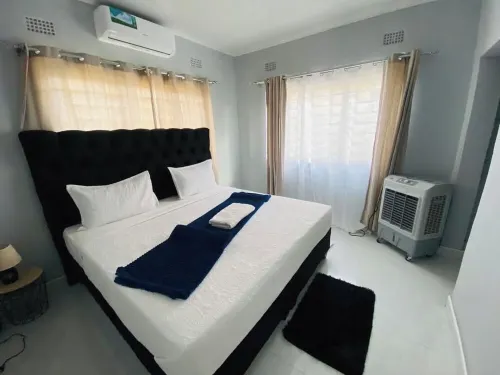 Cozy 2-Bedroom Apartment In Amazing Livingstone With AC, WiFi, 24/7 SOLAR BACKUP