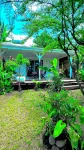 Cottage Majo Lounge located in Saint Pierre in a tropical garden 5min from the sea Hotels in 