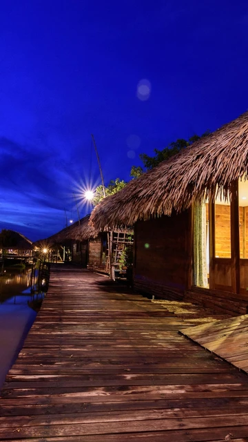 รูปภาพของท่าเรือปากประ บ้านต้นลำพู