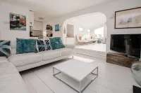 Spacious light cosy beach front house with balcony overlooking the sea