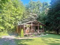 Extremely clean cabin in a quiet setting with an outdoor fire pit.