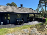 Cozy vacation home in southern Norway (Tromøy, Arendal) with a boat and a pier.