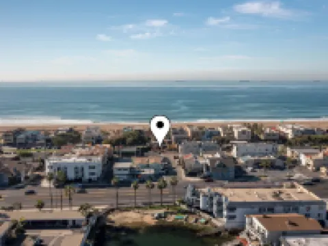 Across quiet street from sandy beach. Hotels in Sunset Beach
