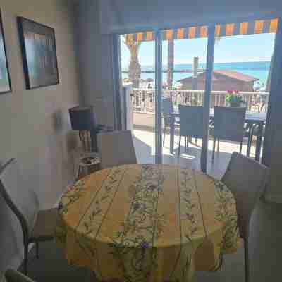 A beautiful beachfront flat for 4 people with a lovely terrace overlooking sea Dining/Meeting Rooms