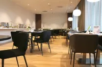 拉文斯堡GINN城市和酒廊酒店 - 早餐