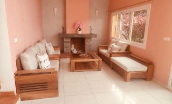 The White-Orange Bedroom with a Pleasant View Overlooking the Lake.