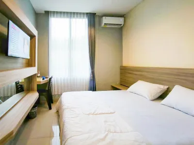 Wikost Premiere Inn Mitra RedDoorz Hotell i Plelen