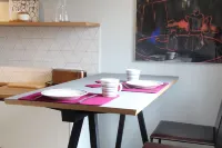 Modern flat facing south with view over mountains and lake