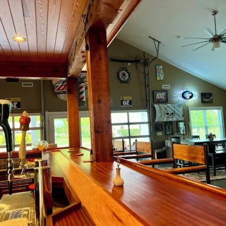 Golf Destination w/ Private Driving Range w/ Lights, and Bar.
