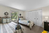 The Beach Retreat is a cozy beach Villa with Hottub overlooking a private beach.