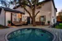 Modern Luxe South Lamar Retreat with Heated Pool, Game Room, and Outdoor Theater