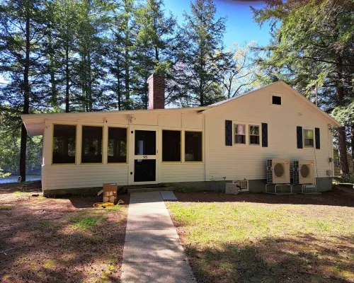 Waterfront camp on quiet part of Lake Winnisquam, dog-friendly, w/dock Hotels in Meredith