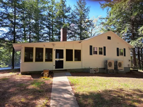 Waterfront camp on quiet part of Lake Winnisquam, dog-friendly, w/dock