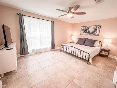 Private 4 bedroom house near the beach with pool, hot tub, fire pit, game room.