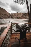 Mid-century modern cowboy retreat with a 35-ft. deck on the Salmon River.