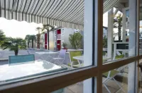 Brit Hotel Essentiel Pau Lescar Hotels in Lons