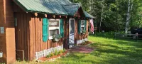 Wood Haven Lodge. Secluded, cozy log cabin in Northern Michigan.
