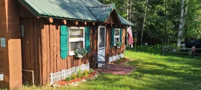 Wood Haven Lodge. Secluded, cozy log cabin in Northern Michigan.
