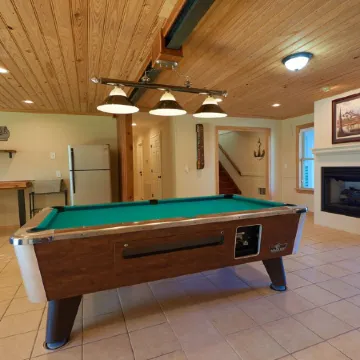 BEAUTIFUL WATERFRONT HOME WITH BOATHOUSE AND HUGE PORCHES!