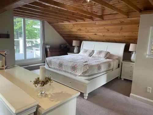 Relax in Raymond's lakefront 2-bedroom vacation home, just steps to Sebago Lake