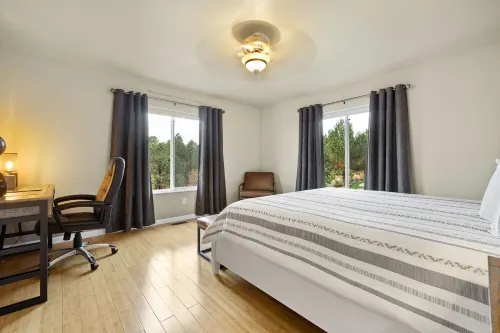 Immaculate modern home with stunning views nestled into a beautiful valley.