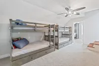 Luxury riverfront home w/ pool, fishing dock, & boat house w/ lift ! Sleeps 14