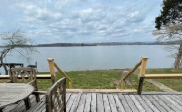 Lakefront home on the main channel w/ beautiful view and a boat ramp next door!