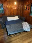 Cozy cabin, lake view, screened porch, 100 steps to the areas best beach.