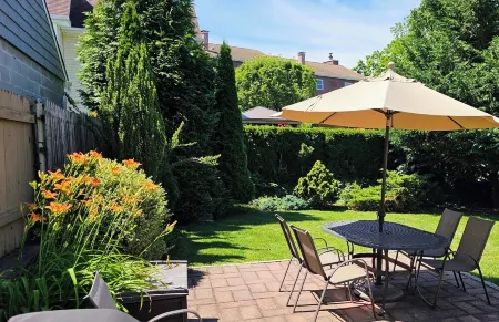 Quaint duplex with private yard. Walk to beach, dining, & shopping!