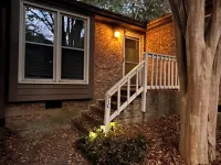 Cozy one level, 2 BR, 2 Bath TH in charming wooded community. Perfect location!