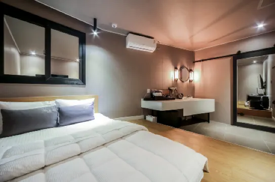 Busan Janglim to Heart Отели рядом с достопримечательностью «Морской пляж Тадэпхо»