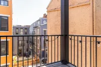 Cozy Downtown Loft: 2BR condo w/ AC, WiFi, Balcony & Free 2-car parking.