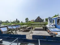 Cushy Boat in Merkem with Terrace Hotels in Houthulst