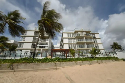 Branco Haus - Pé na Areia do Caribessa