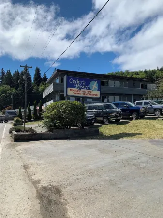 Curley's Resort & Dive Center Отели в г. Секиу