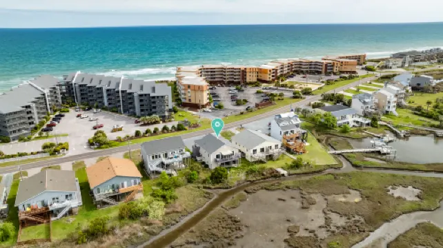 Tranquil Sound Access and Expansive Deck - Charming Coastal Retreat