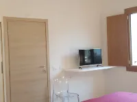 B. Sinis Hotel a Cabras