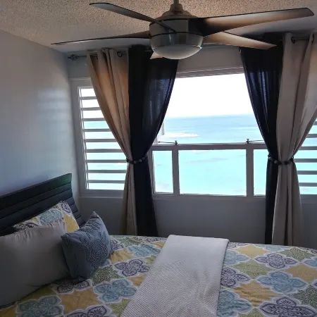 Breezy Beachfront Apt. View of Paradise