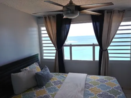 Breezy Beachfront Apt. View of Paradise