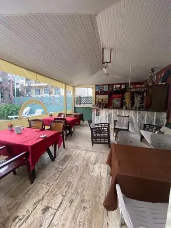 El Latino Otel Отели рядом с достопримечательностью «Çekirdeksiz Mandalin Camping Kemer Antalya Çadır Karavan Kamp Alanı»