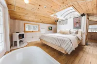 Treehouse lifted up over a stocked trout pond up in the beautiful birch trees!