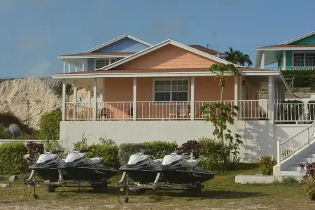 Exuma Point - Swimming Pigs Resort Bougainvillea (Pink) Sunset Villa 1 Отели в г. Rolleville