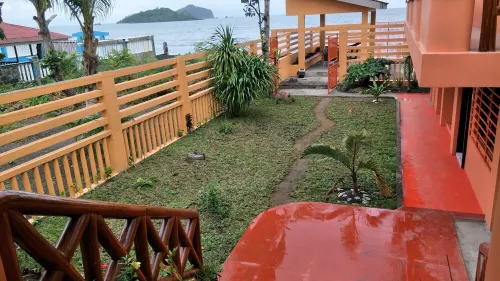 Relaxing beach side condo with mountain and island views. Hotels in Calapan