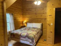 Secluded cozy cabin nestled among the hemlocks and rock formations in Hocking