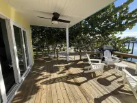 Big Yellow House with Dock on Deep Water Canal and Dock Power Available Hotels in Great Abaco