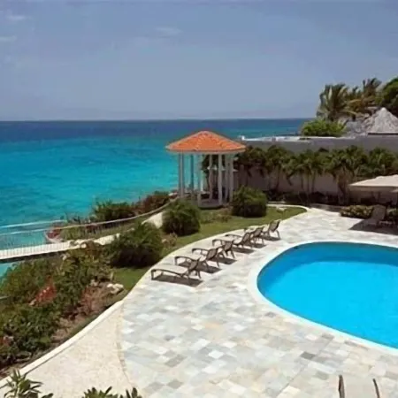 Cupecoy ocean view 2BR condo - pools/private beach