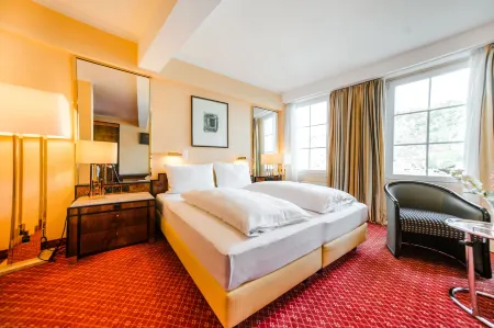 Hotel Rheinfels Отели в г. Патерсберг