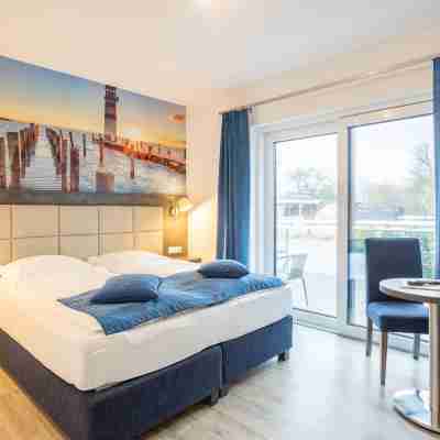 Familien- Und Aparthotel Strandhof Rooms